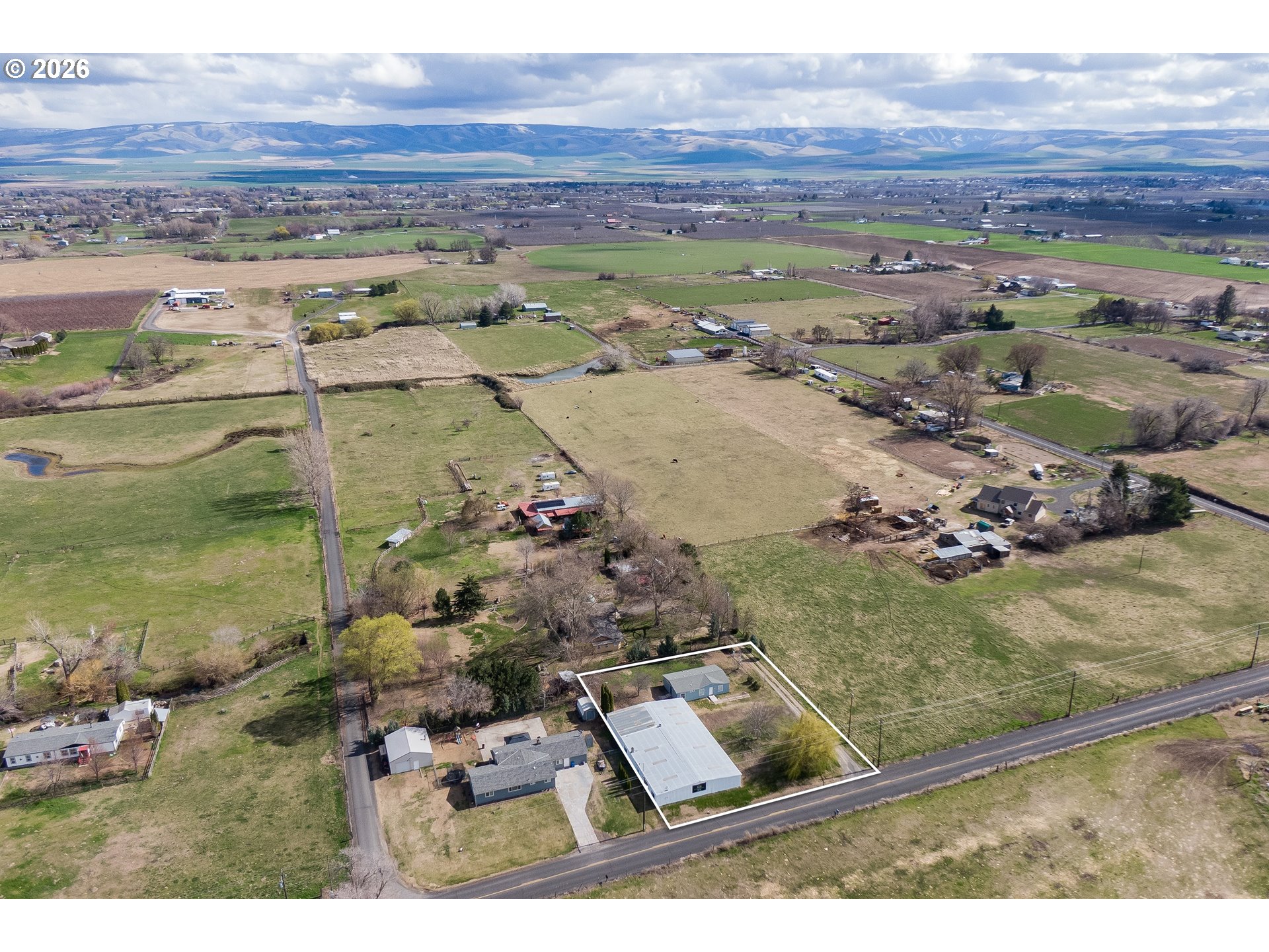 84889 Triangle Station Road Milton Freewater, OR 97862 - Photo 3 of 40 an aerial view of residential houses with outdoor space