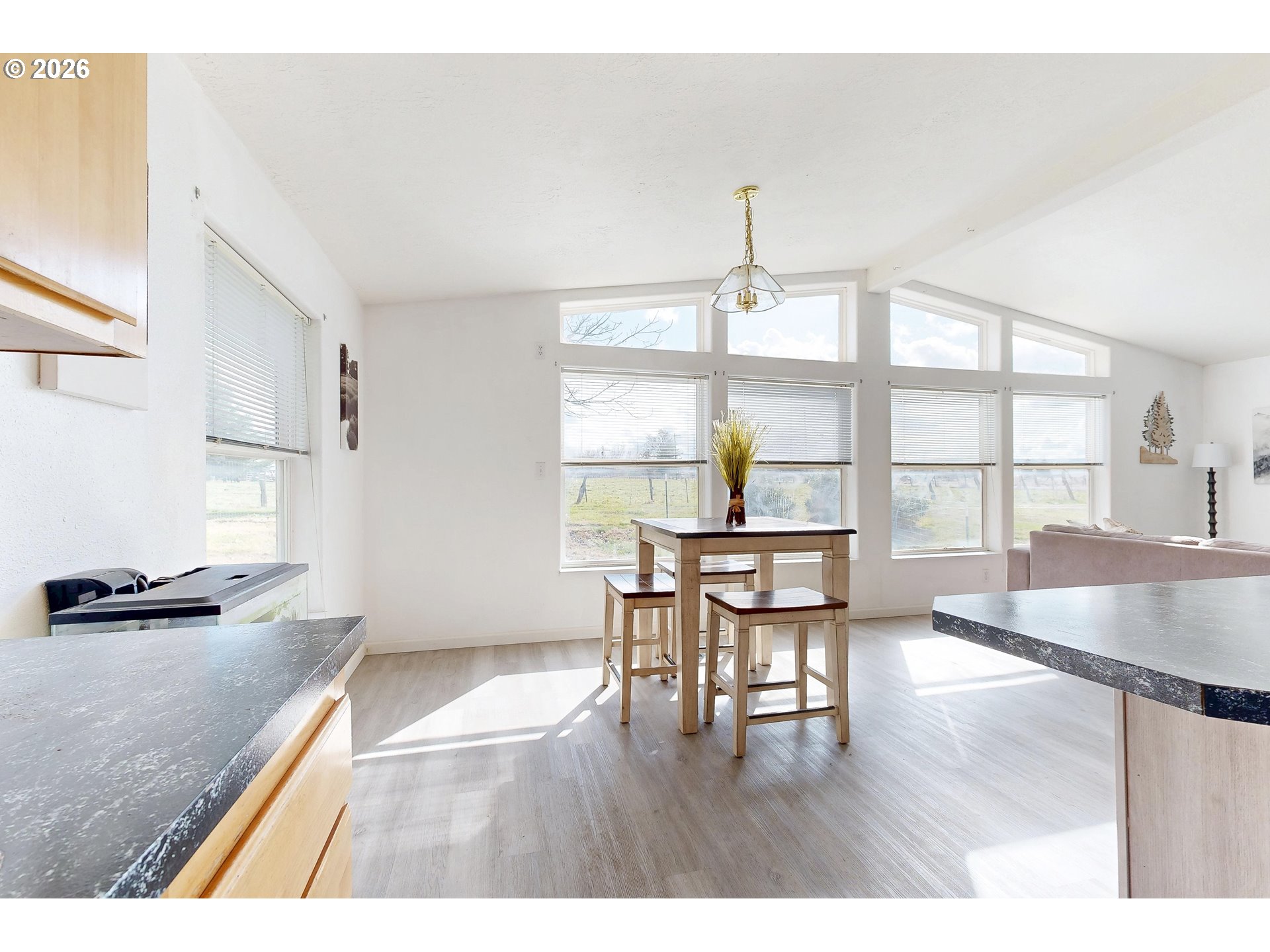 84889 Triangle Station Road Milton Freewater, OR 97862 - Photo 7 of 40 a living room with furniture and a large window