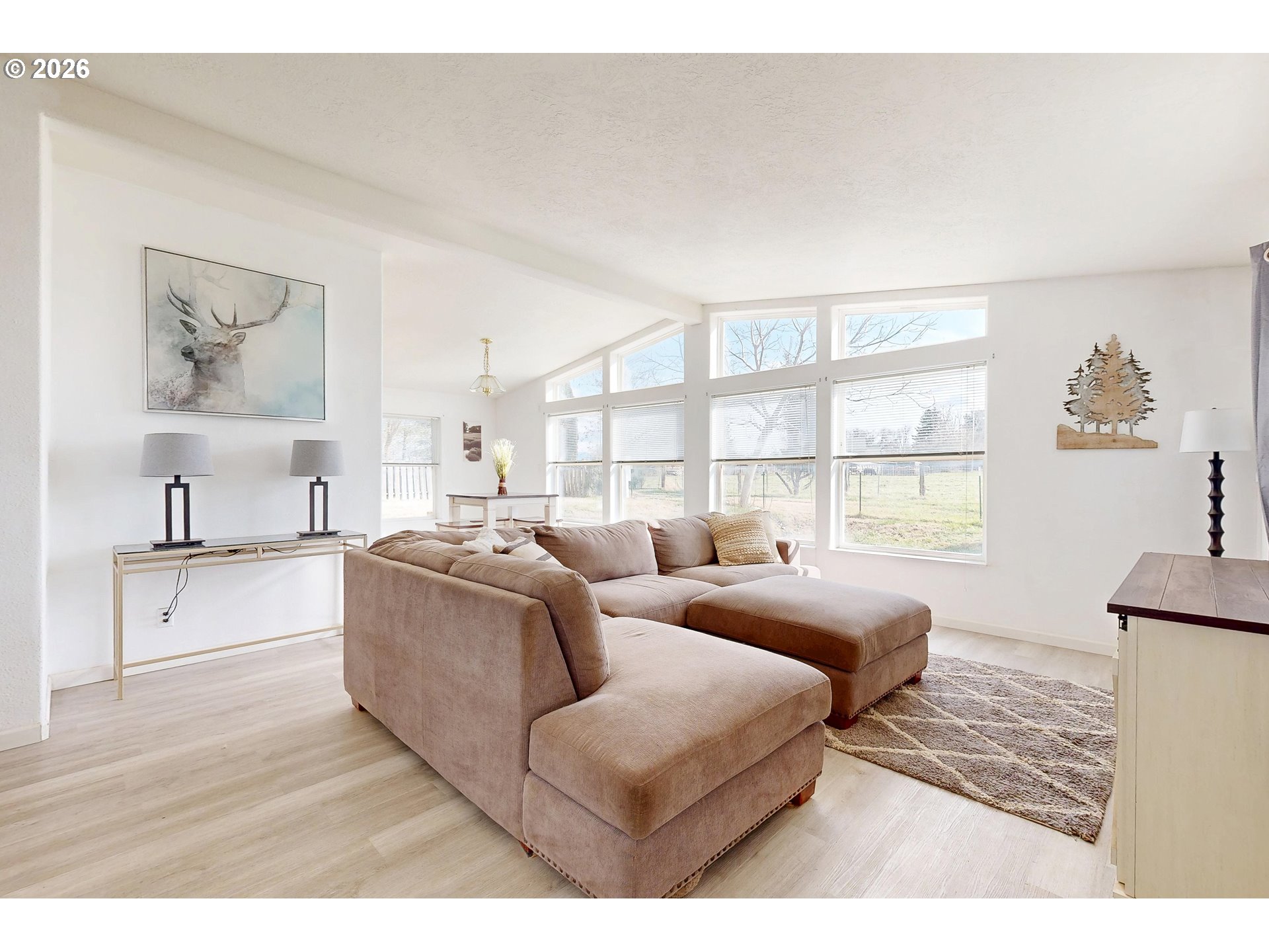 84889 Triangle Station Road Milton Freewater, OR 97862 - Photo 9 of 40 a living room with furniture and a window