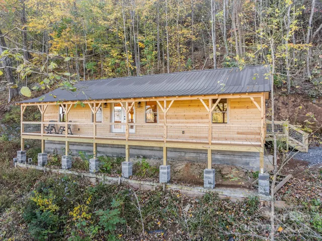 a view of a swimming pool with a yard