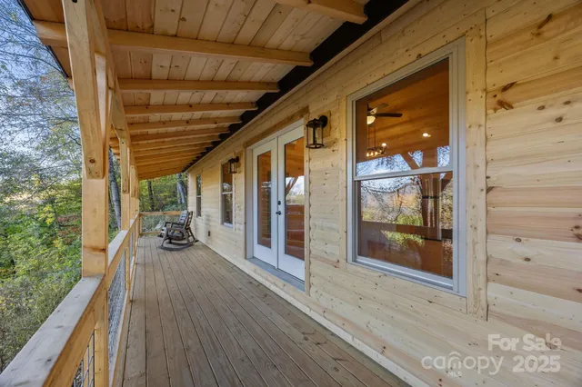 a outdoor space with wooden floor and outdoor seating