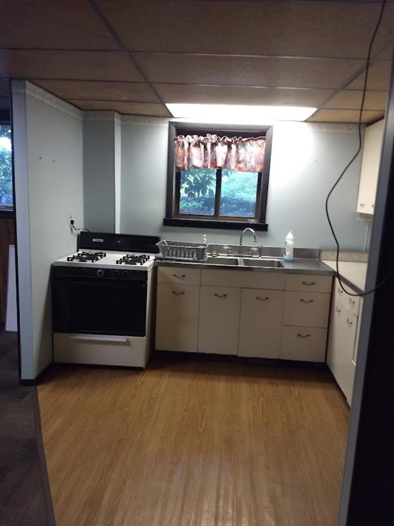 278 Holyoke Road Butler, PA 16001 - Photo 24 of 24 a kitchen with stainless steel appliances a stove sink and wooden floor