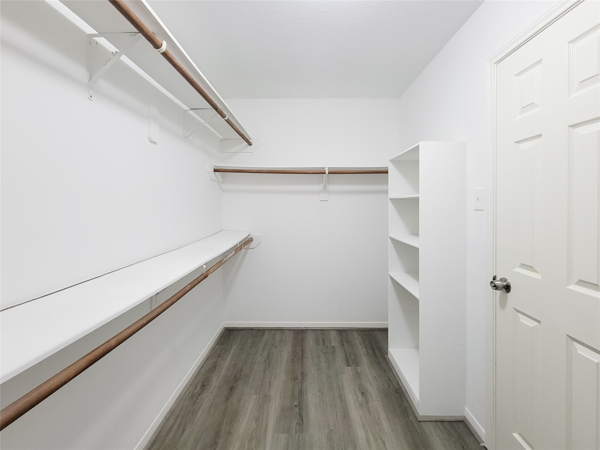 3602 Zephyr Glen Way Houston, TX 77084 - Photo 23 of 42 a view of small space with racks on the wall