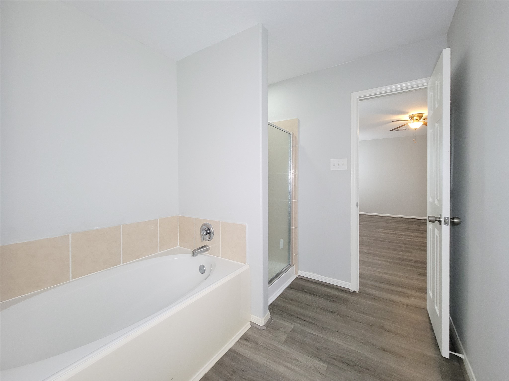 3602 Zephyr Glen Way Houston, TX 77084 - Photo 24 of 42 a bathroom with a bathtub and shower