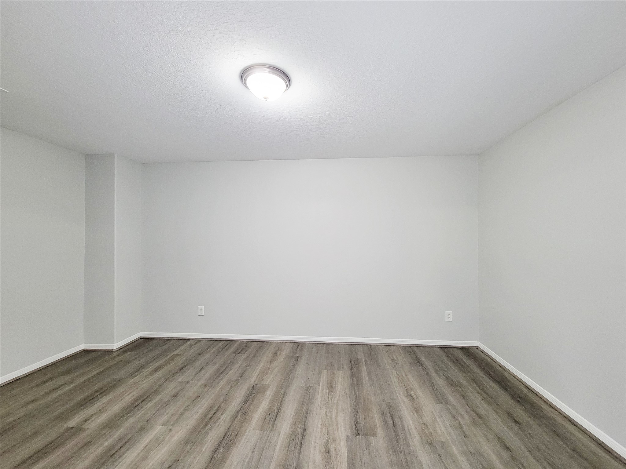 3602 Zephyr Glen Way Houston, TX 77084 - Photo 31 of 42 a view of an empty room and wooden floor