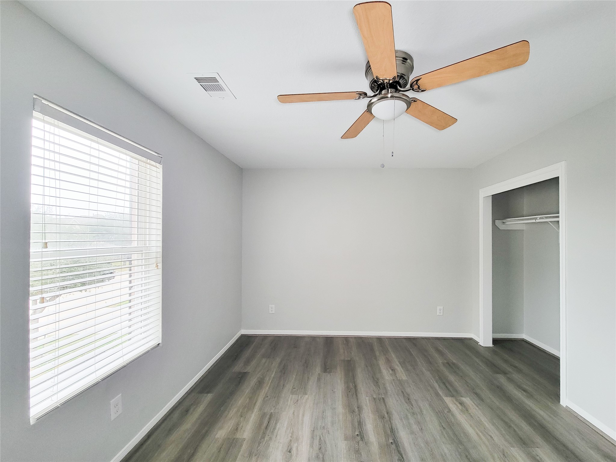 3602 Zephyr Glen Way Houston, TX 77084 - Photo 33 of 42 a view of a room with wooden floor and a window