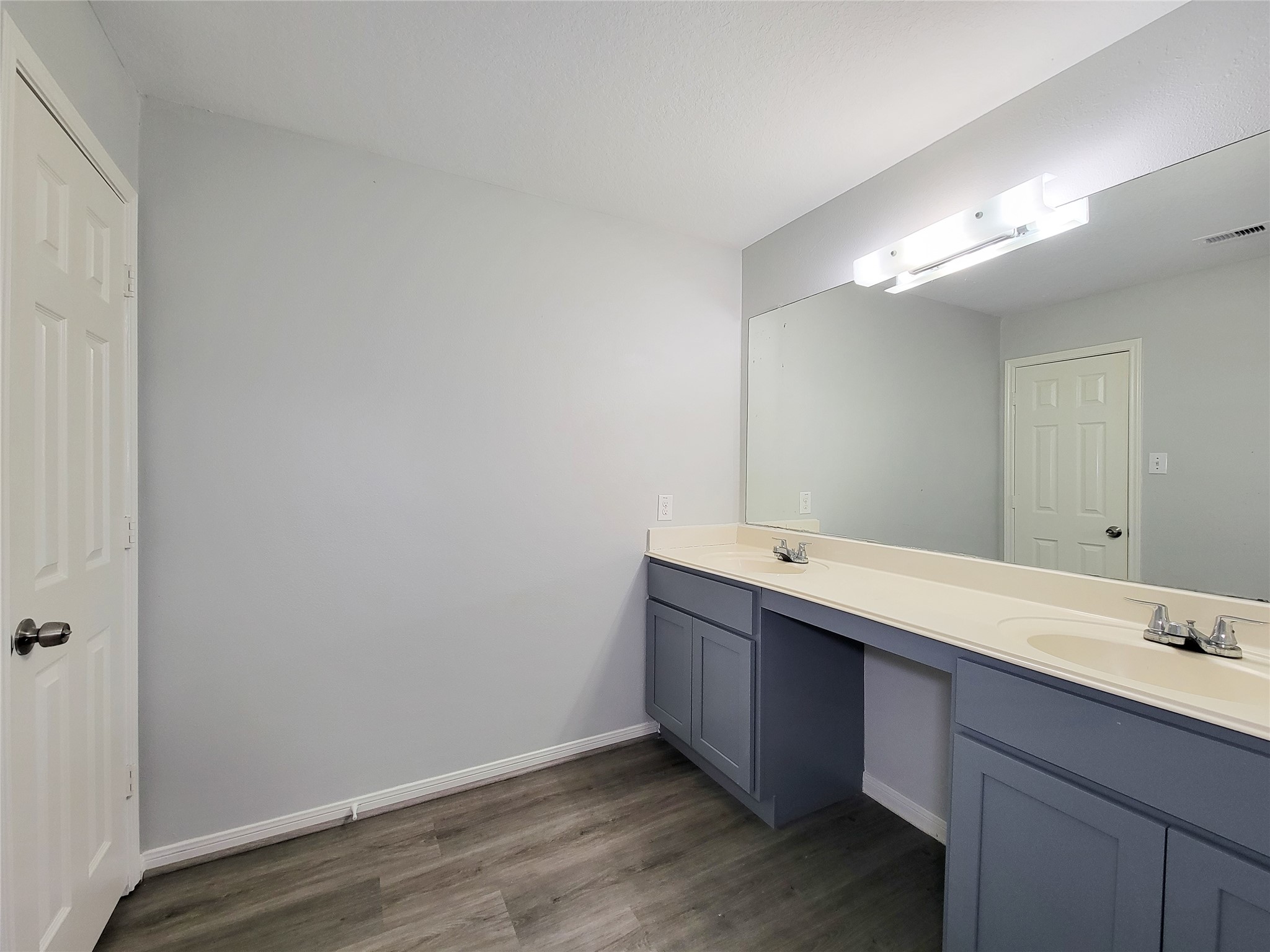 3602 Zephyr Glen Way Houston, TX 77084 - Photo 36 of 42 a bathroom with a double vanity sink and a mirror