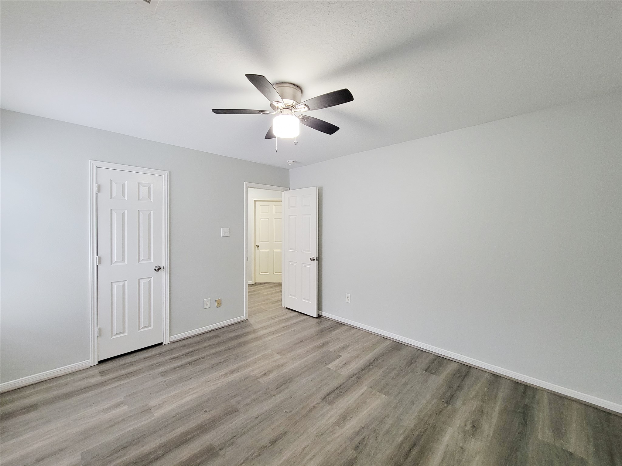 3602 Zephyr Glen Way Houston, TX 77084 - Photo 39 of 42 wooden floor in an empty room