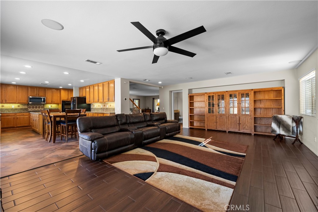 32810 The Old Road Castaic, CA 91384 - Photo 12 of 45 a living room with furniture and a wooden floor