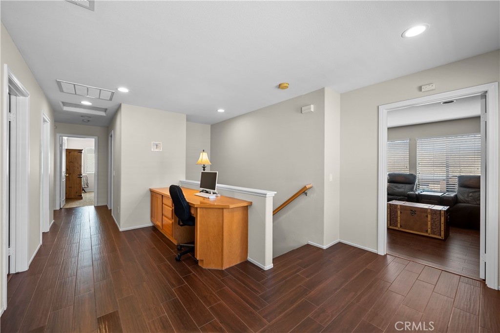32810 The Old Road Castaic, CA 91384 - Photo 20 of 45 a room with furniture and wooden floor