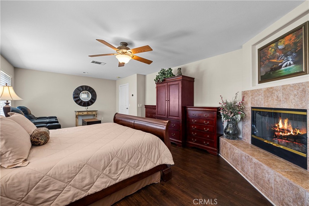 32810 The Old Road Castaic, CA 91384 - Photo 24 of 45 a bedroom with a bed and a fireplace