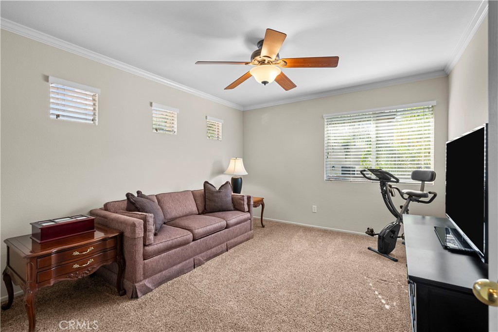 32810 The Old Road Castaic, CA 91384 - Photo 33 of 45 a living room with furniture a ceiling fan and a window
