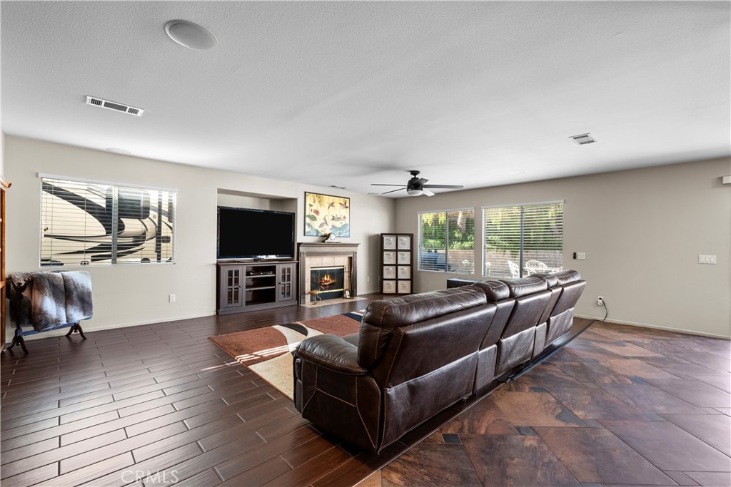 32810 The Old Road Castaic, CA 91384 - Photo 9 of 45 a living room with furniture and a flat screen tv