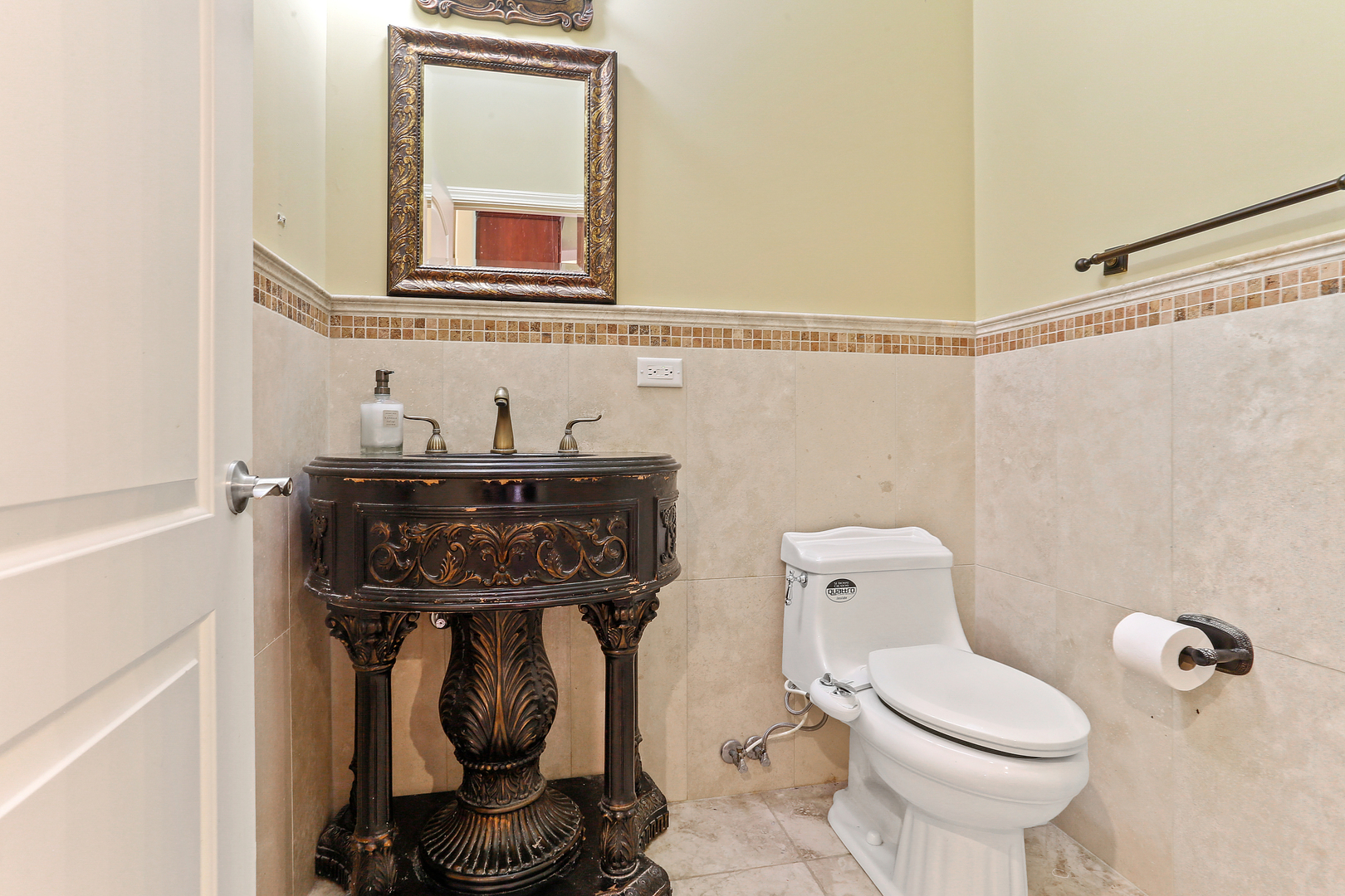 54 Sawgrass Drive Lemont, IL 60439 - Photo 12 of 41 a bathroom with a toilet and a sink