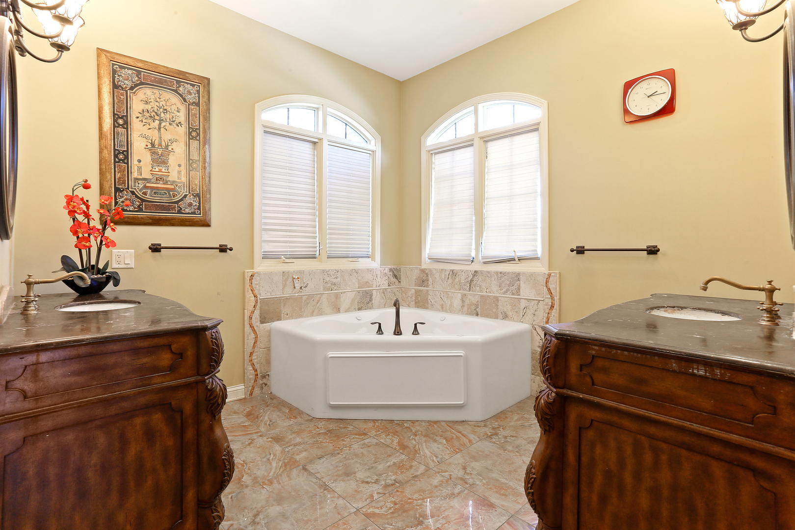 54 Sawgrass Drive Lemont, IL 60439 - Photo 14 of 41 a bathroom with a sink and a bathtub