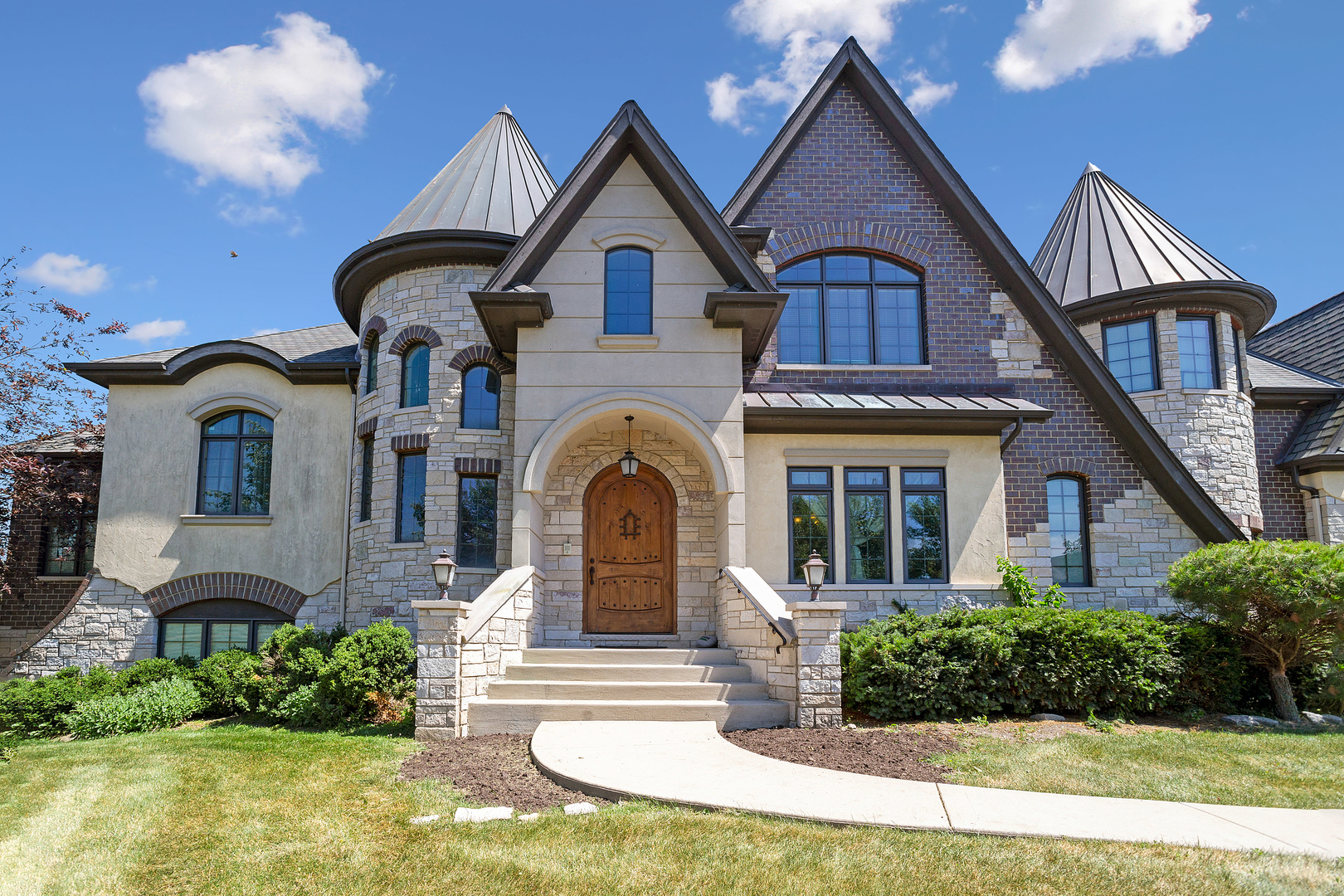54 Sawgrass Drive Lemont, IL 60439 - Photo 2 of 41 a front view of a house with a yard