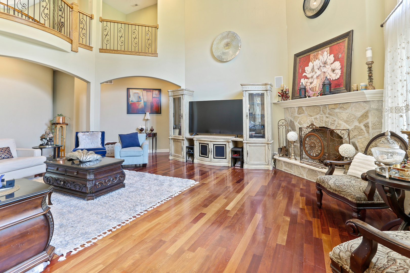 54 Sawgrass Drive Lemont, IL 60439 - Photo 8 of 41 a living room with furniture and a flat screen tv