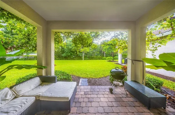 a view of a garden with a fountain