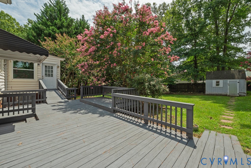 6901 Manning Road Chesterfield, VA 23832 - Photo 19 of 57 Expansive outdoor deck with gray-finished wood pla