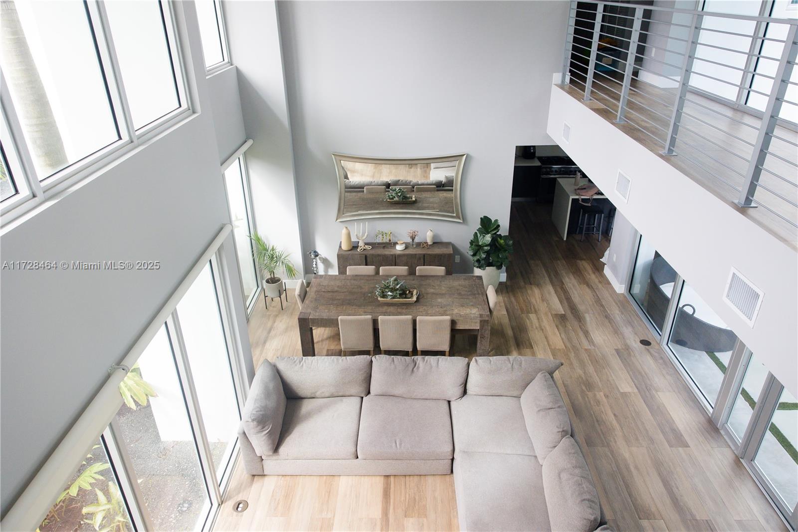 6790 Southwest 72nd Street South Miami, FL 33143 - Photo 23 of 34 a view of living room with furniture and large window