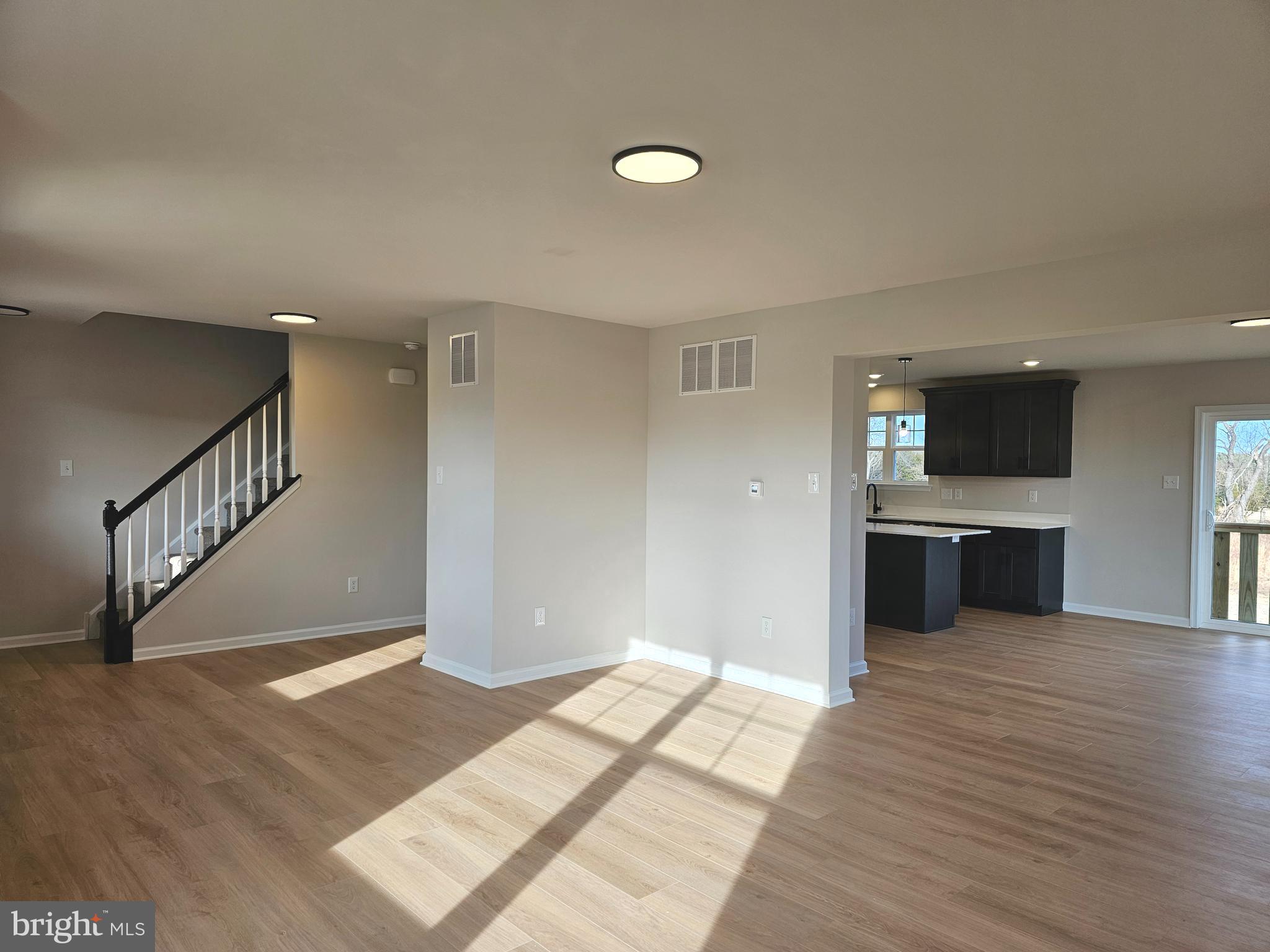 16 Field Stone Court Bridgeton, NJ 08302 - Photo 6 of 20 a view of a kitchen with a sink and a microwave