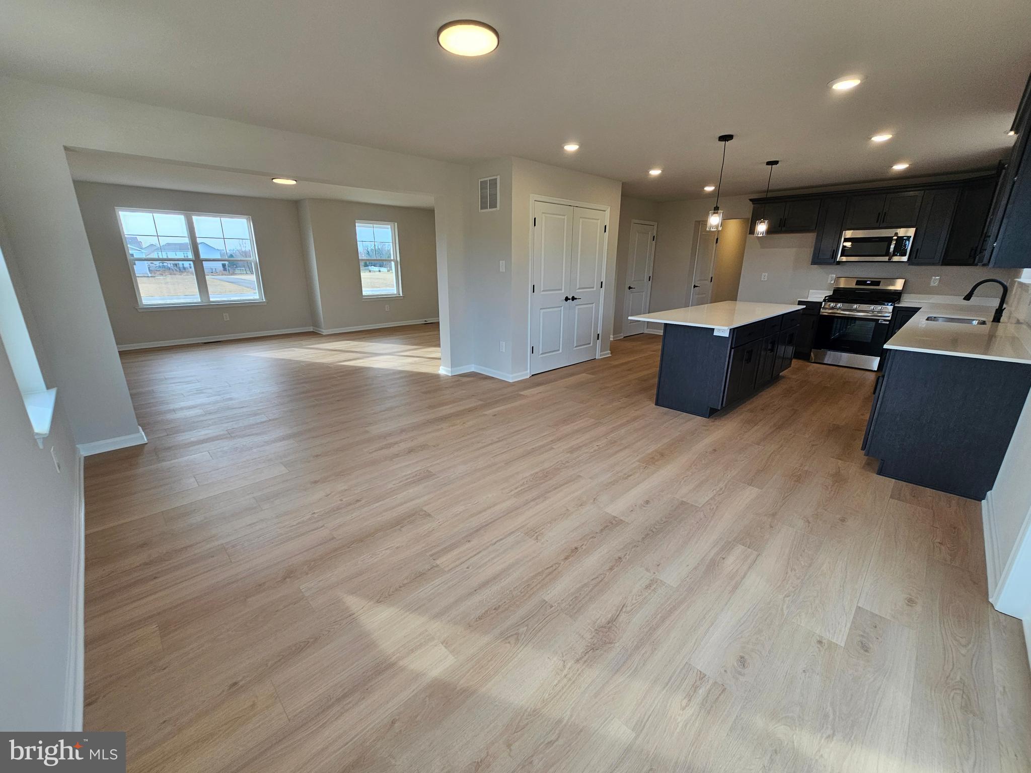 16 Field Stone Court Bridgeton, NJ 08302 - Photo 8 of 20 a view of kitchen with furniture and wooden floor