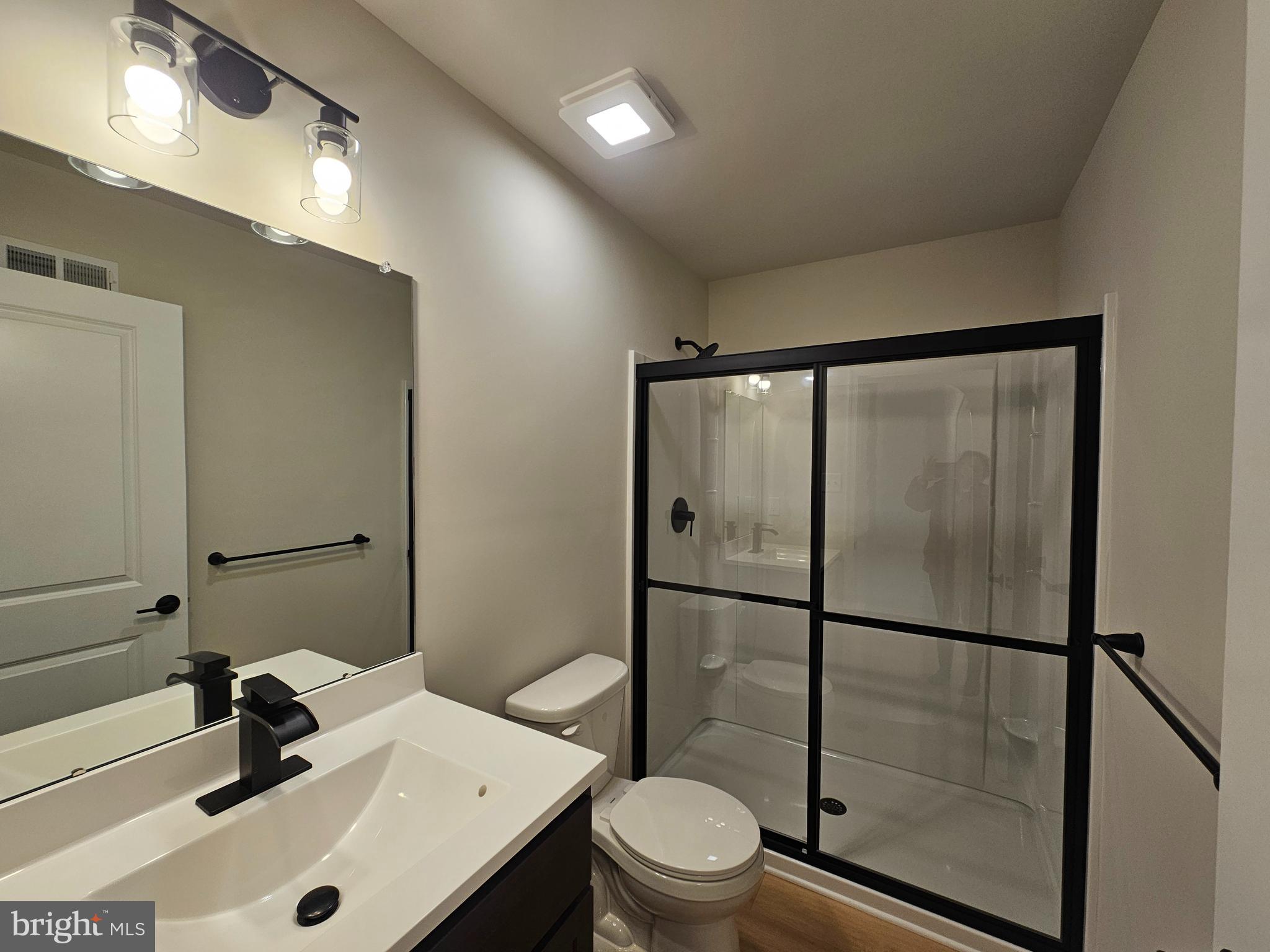 16 Field Stone Court Bridgeton, NJ 08302 - Photo 9 of 20 a bathroom with a sink toilet and shower