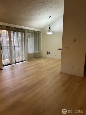 a close view of a sink and a microwave