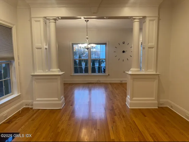 a kitchen with a refrigerator and a stove