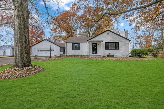 a house view with a garden space