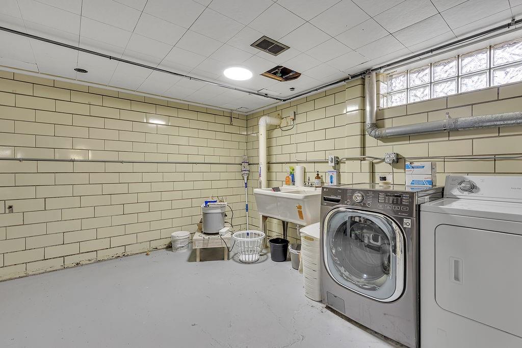 250 Neville Road Beaver, PA 15009 - Photo 24 of 36 a view of a storage & utility room with washer and dryer