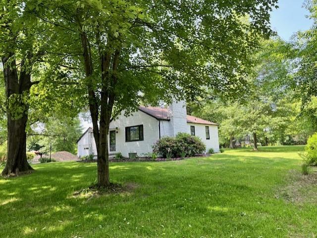 250 Neville Road Beaver, PA 15009 - Photo 33 of 36 a front view of house with yard and green space