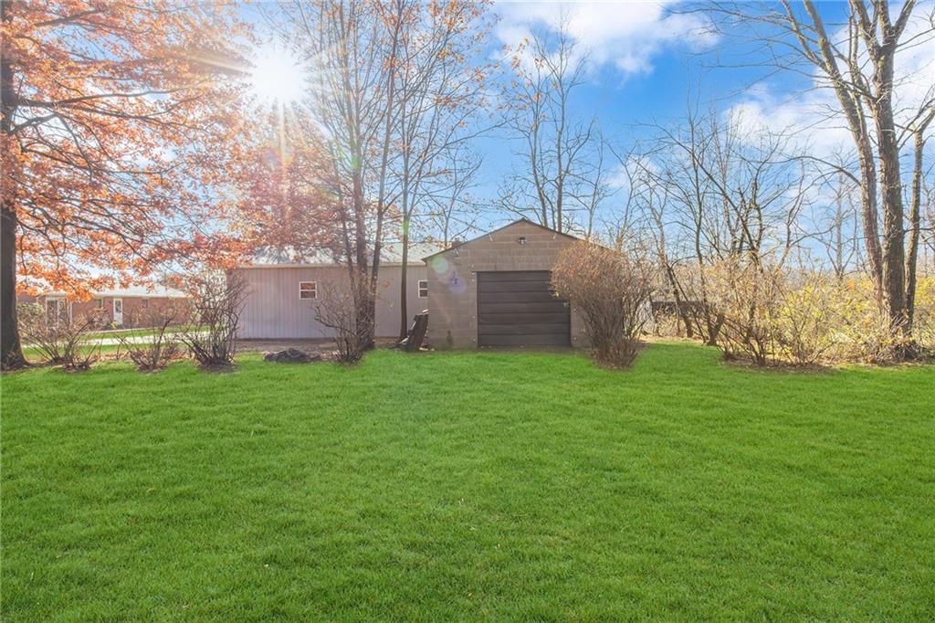250 Neville Road Beaver, PA 15009 - Photo 34 of 36 a backyard of a house with lots of green space