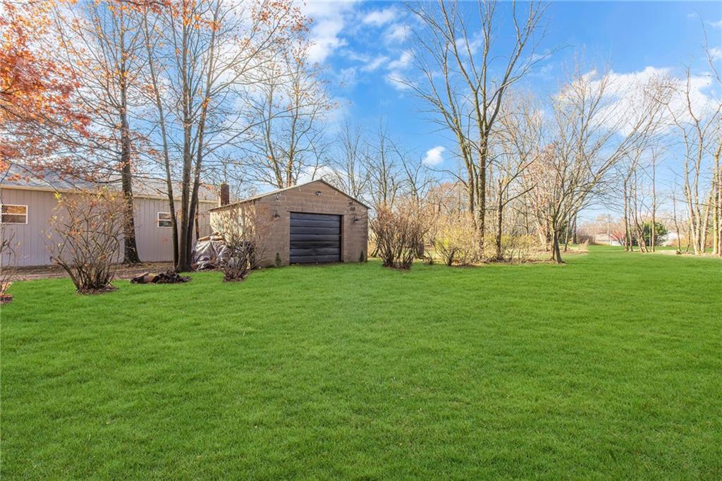 250 Neville Road Beaver, PA 15009 - Photo 35 of 36 a backyard of a house with lots of green space