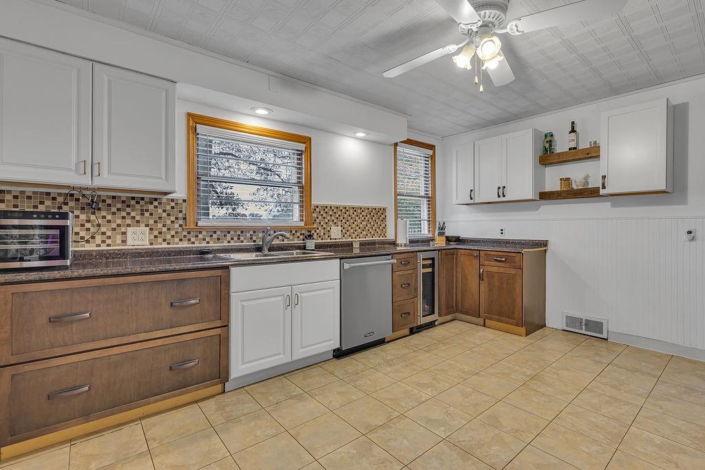 250 Neville Road Beaver, PA 15009 - Photo 8 of 36 a kitchen with a sink cabinets and window