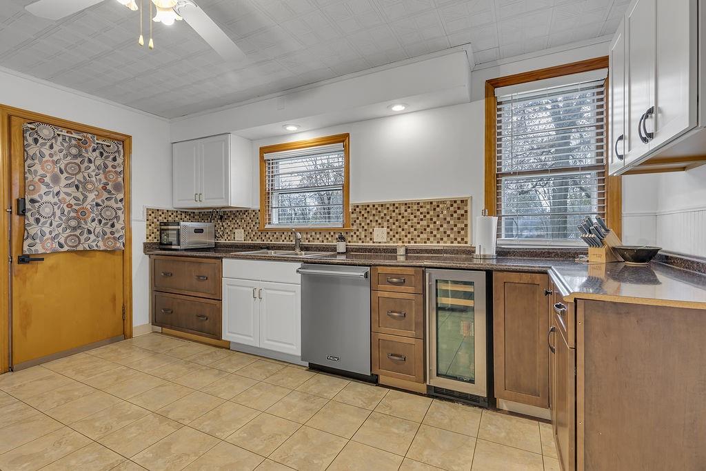 250 Neville Road Beaver, PA 15009 - Photo 9 of 36 a kitchen with a stove sink and cabinets