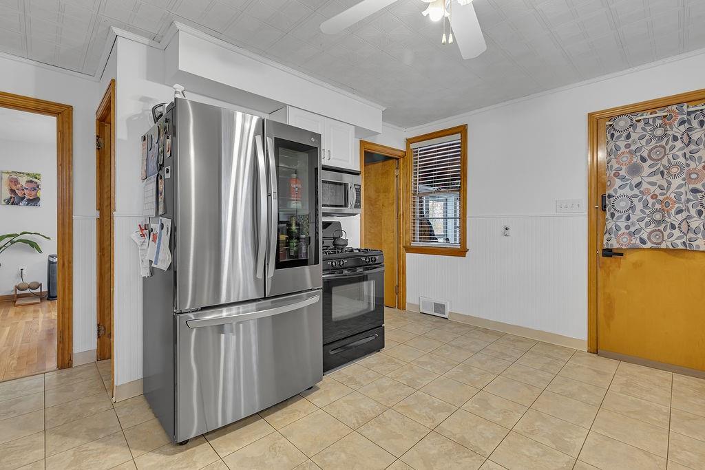250 Neville Road Beaver, PA 15009 - Photo 10 of 36 a kitchen with stainless steel appliances granite countertop a refrigerator and a sink