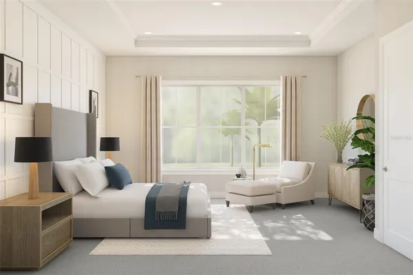 a bedroom with a bed and a couch