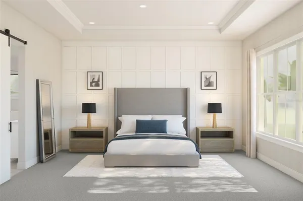 a bedroom with a large bed and a couch