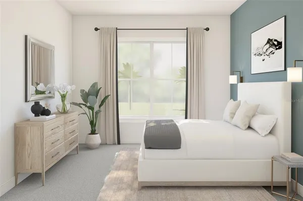 a bedroom with a bed potted plant with the dresser in it