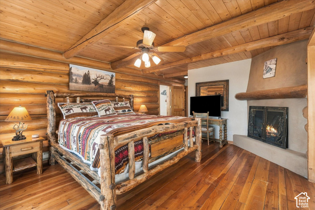 1701 Oak Road Coalville, UT 84017 - Photo 29 of 71 Log walls and ceiling with exposed beams