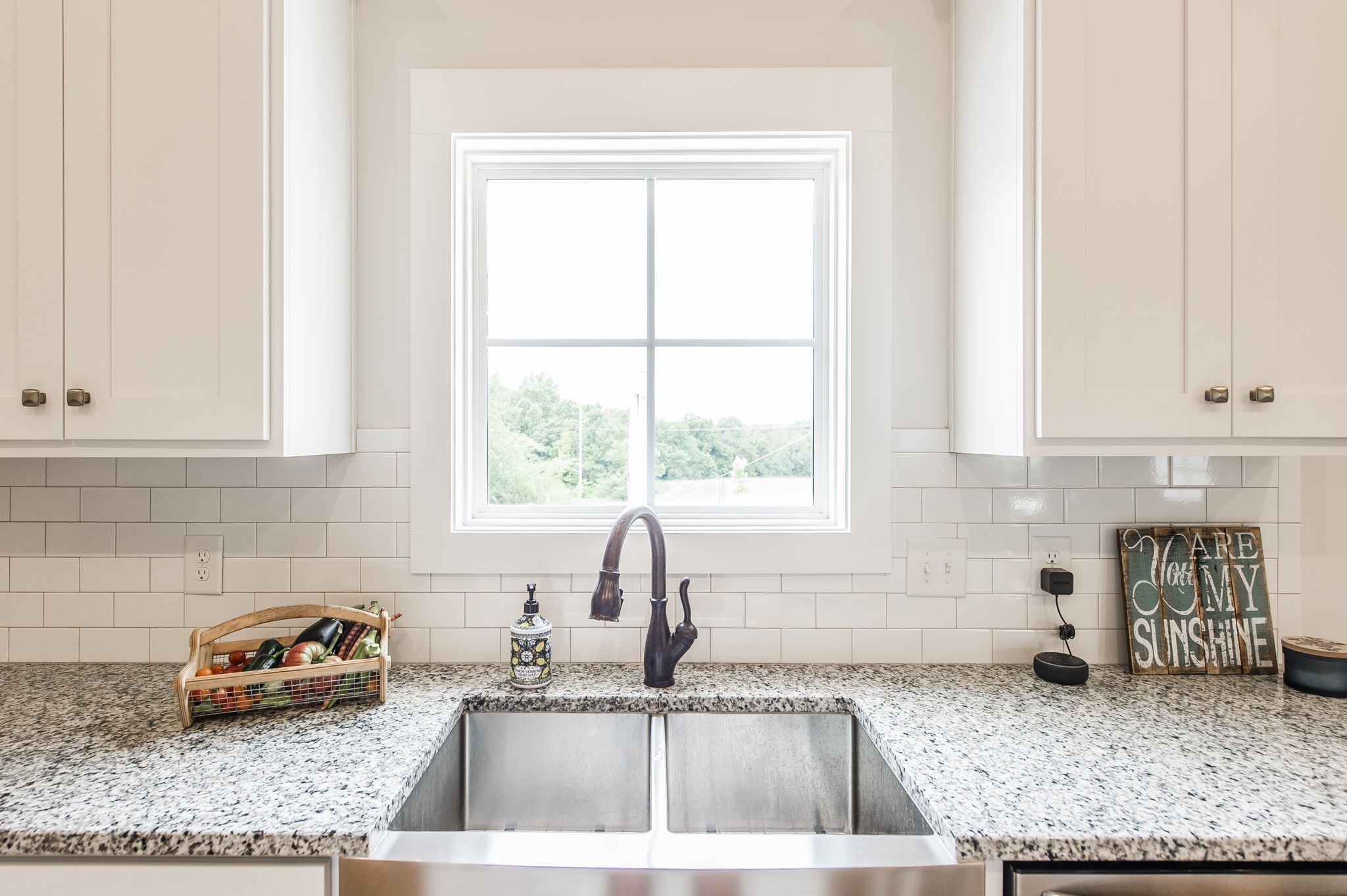 3186 Battle Creek Road Springfield, TN 37172 - Photo 19 of 59 a kitchen with granite countertop a sink and a window