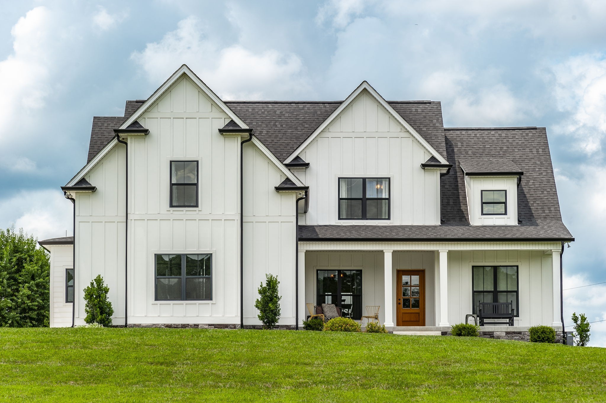 3186 Battle Creek Road Springfield, TN 37172 - Photo 2 of 59 a front view of a house with a yard and trees