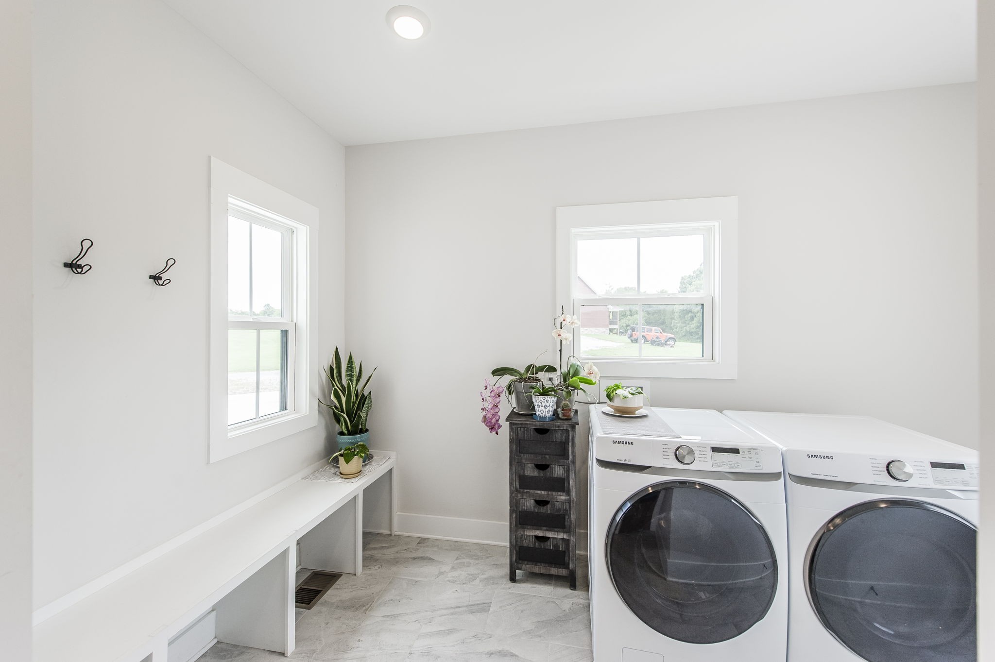 3186 Battle Creek Road Springfield, TN 37172 - Photo 24 of 59 a view of a room that has a window and a washer and dryer
