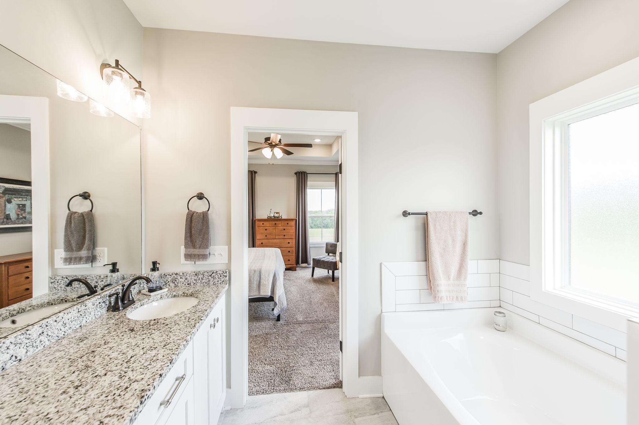 3186 Battle Creek Road Springfield, TN 37172 - Photo 29 of 59 a bathroom with a granite countertop sink and a mirror