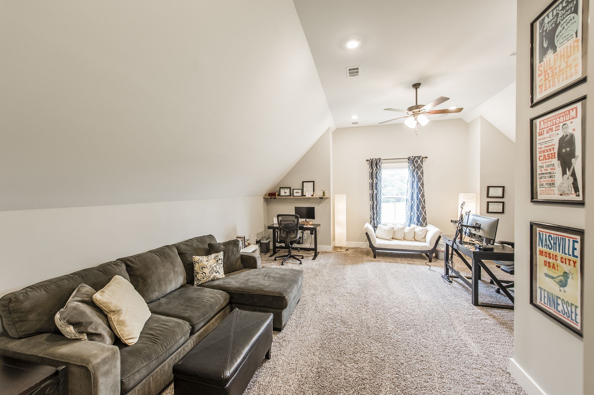 3186 Battle Creek Road Springfield, TN 37172 - Photo 31 of 59 a living room with furniture and a chandelier
