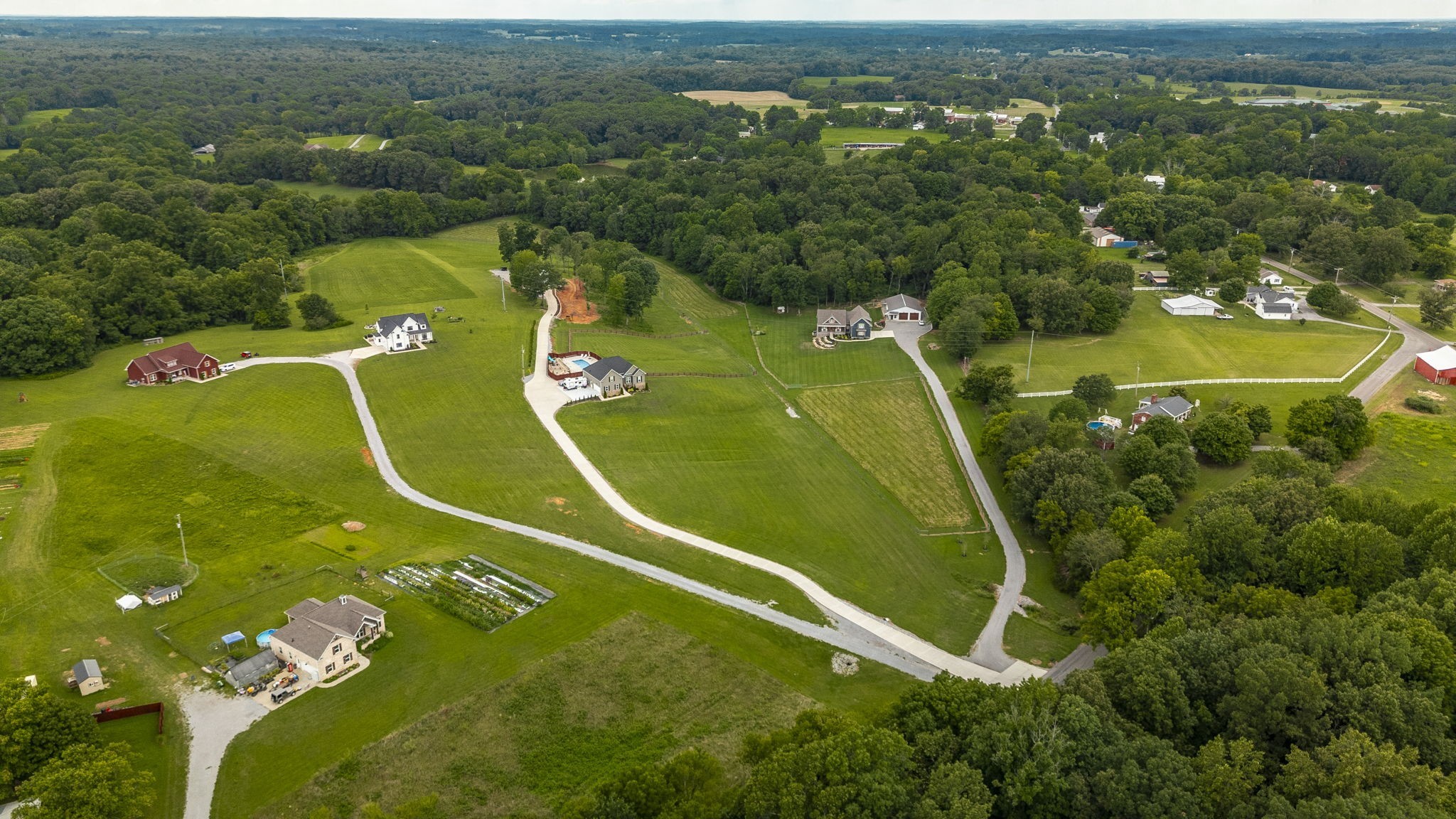 3186 Battle Creek Road Springfield, TN 37172 - Photo 54 of 59 an aerial view of a golf course with a swimming pool