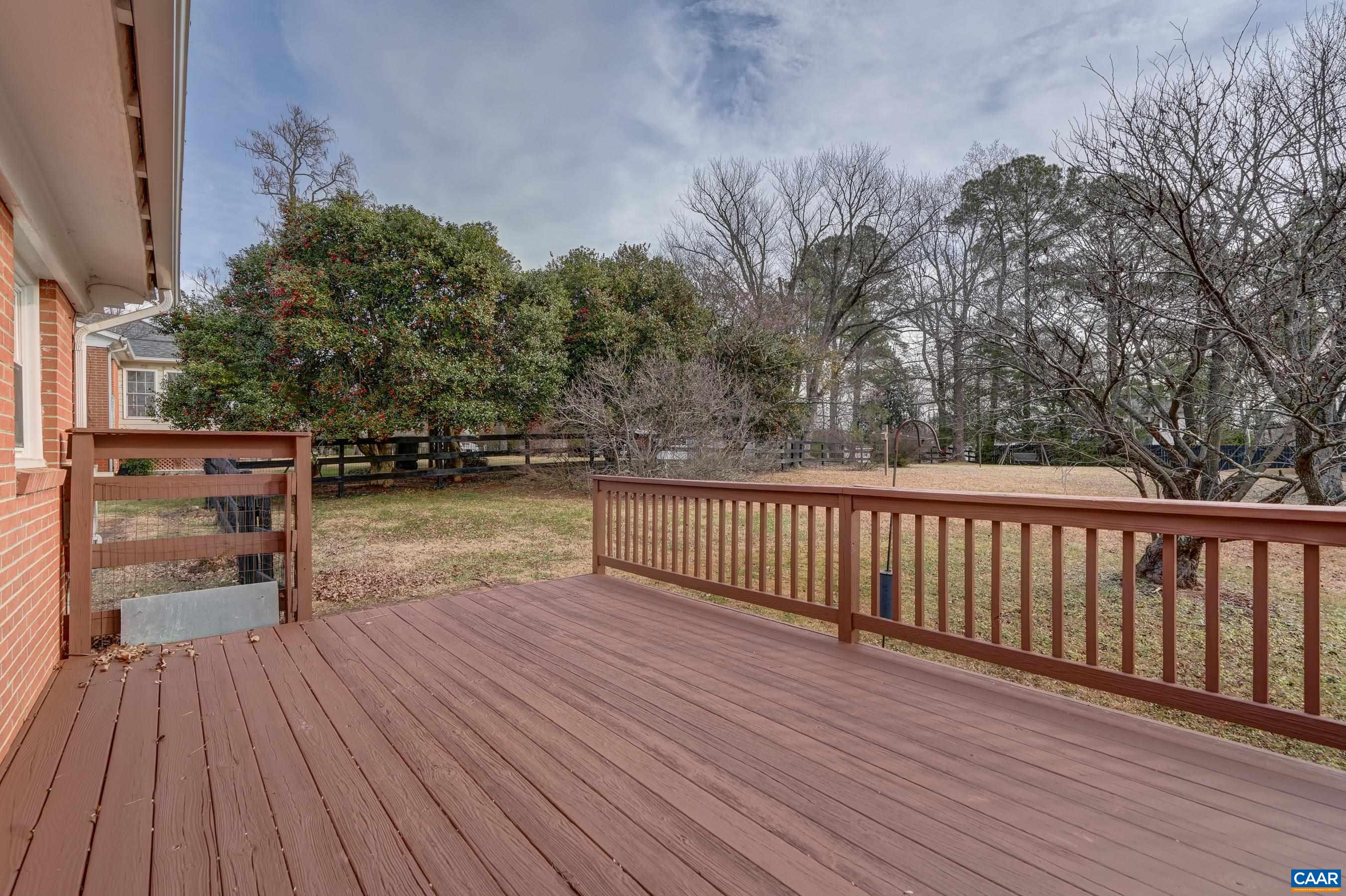 1179 Blue Ridge Avenue Crozet, VA 22932 - Photo 19 of 43 a view of balcony with wooden floor and fence