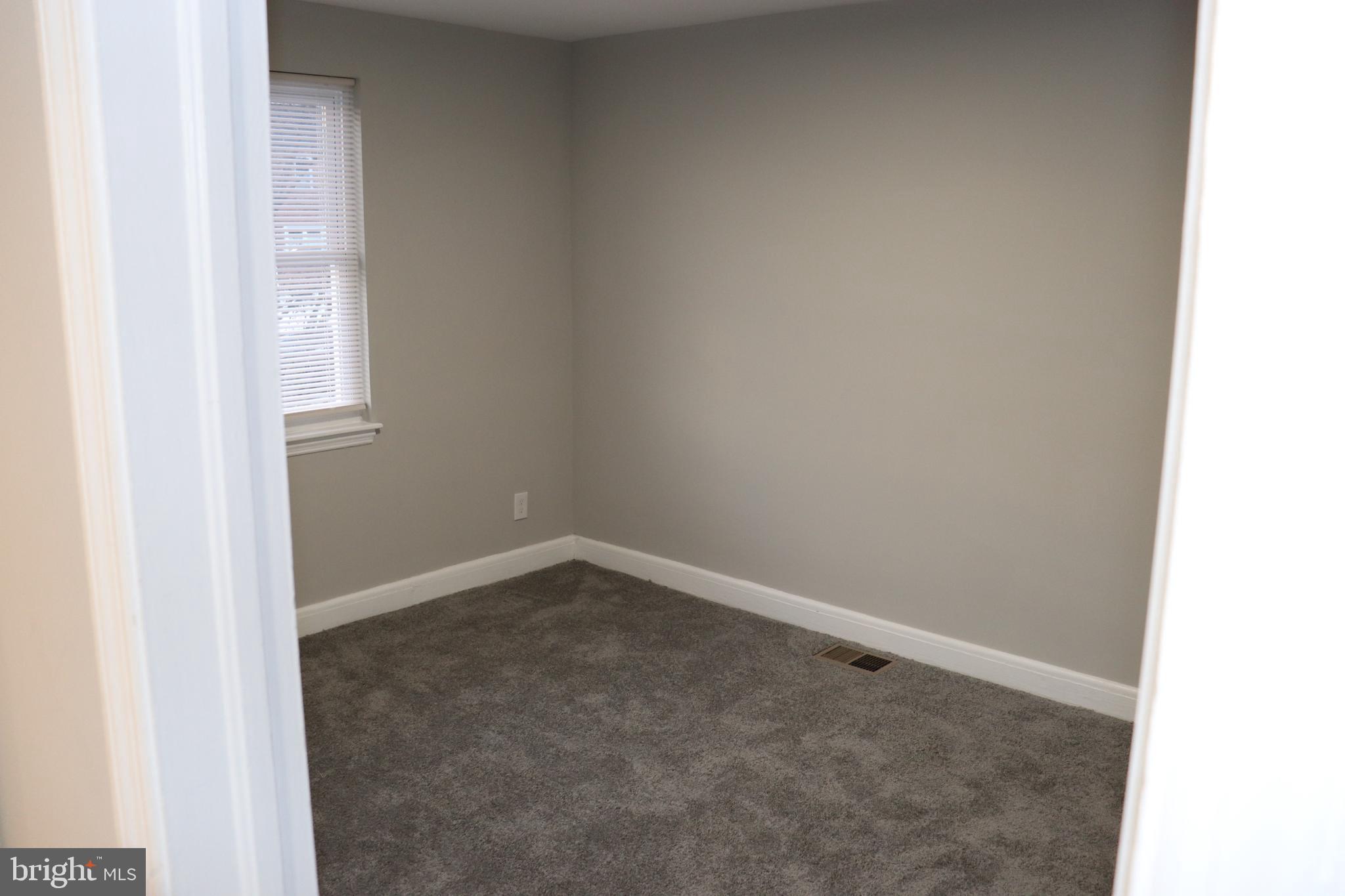 8623 Willow Oak Road Parkville, MD 21234 - Photo 19 of 27 a view of an empty room