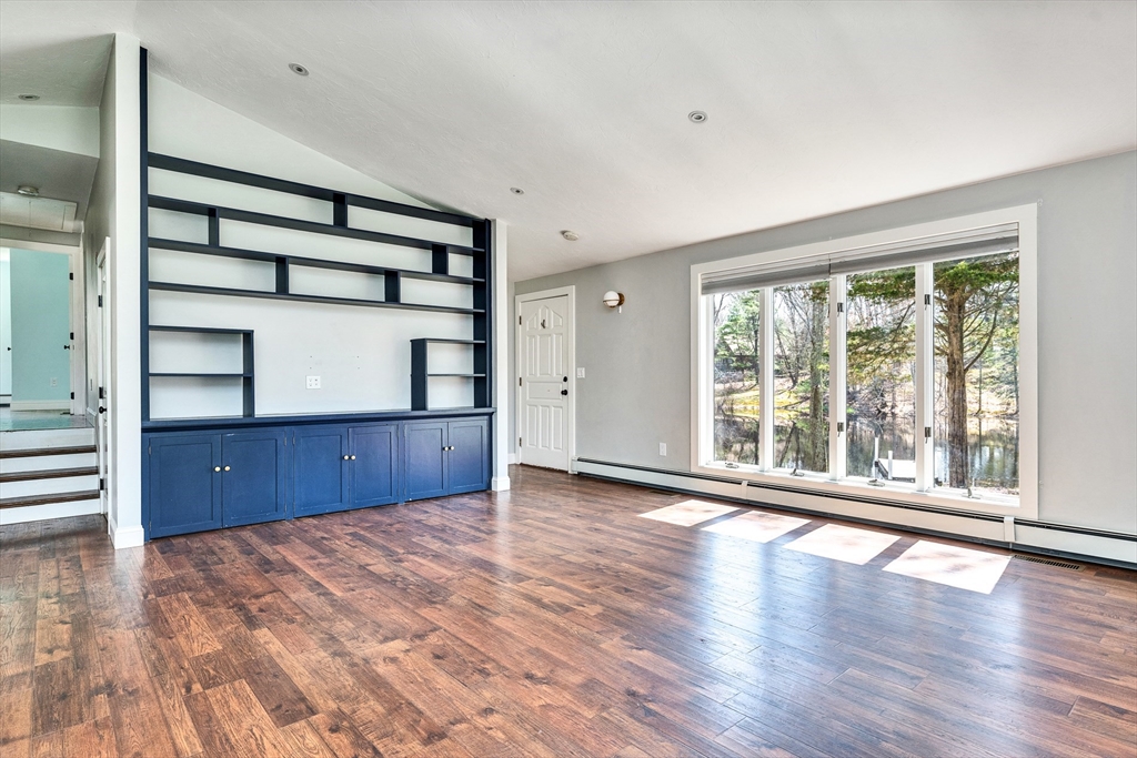 151 Wheeler Street Rehoboth, MA 02769 - Photo 12 of 36 wooden floor in an empty room with a window